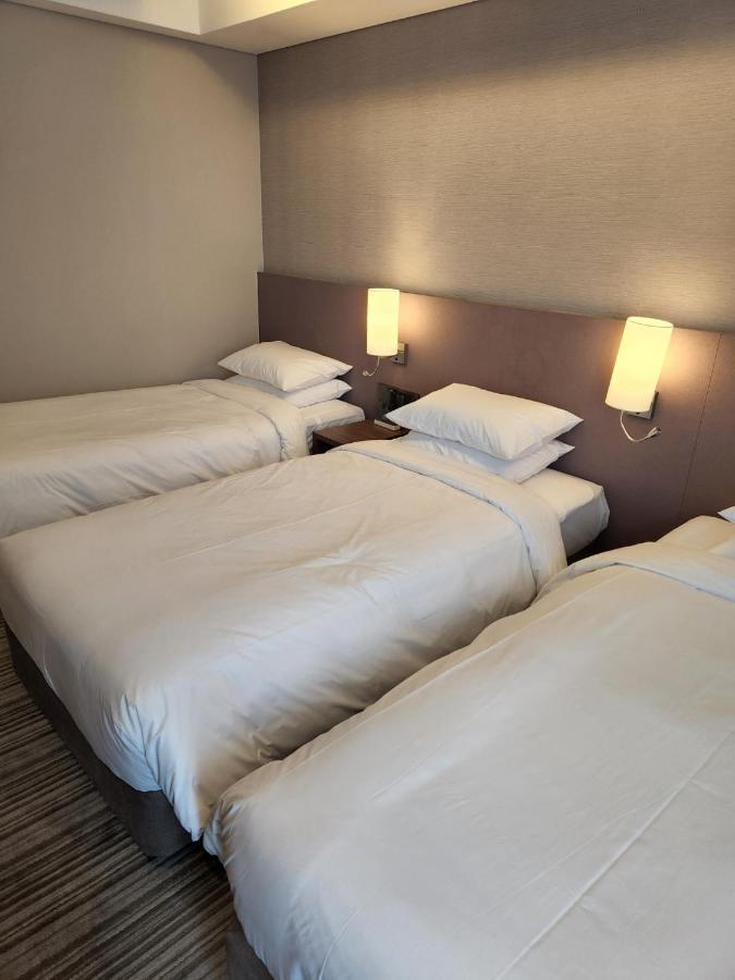 Island Hotel Busan Bagian luar foto